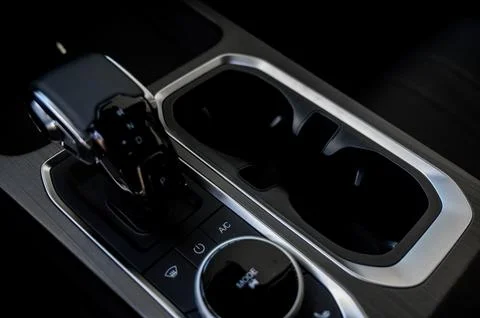 Automatic transmission selector in the interior of a modern car. Stock Photos