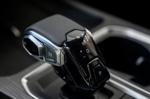 Automatic transmission selector in the interior of a modern car. Stock Photos