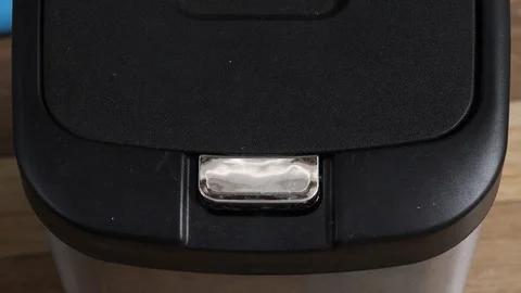 Automatic trash button open hand press Stock Footage 126892031