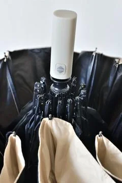 Automatic umbrella handle with opening and closing button Photos