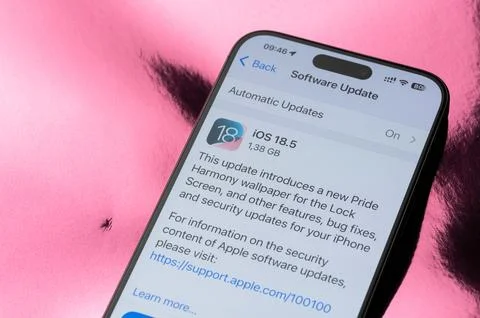 Automatic update on smartphone IOS 18 Stock Photos