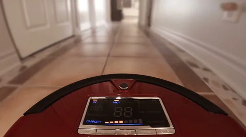 Automatic Vacuum Robot Cleaning the House Floor Itself Stock Footage 48842745