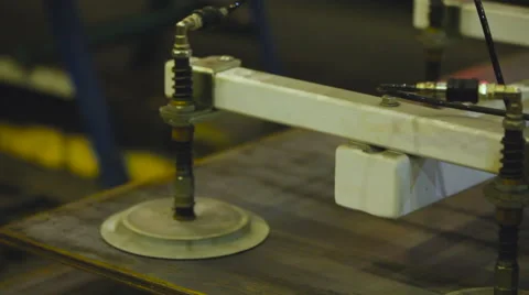 Automatic Vacuum Transfer System Picks up a Sheet of Metal. Vacuum Traverse. Video stock 62573844