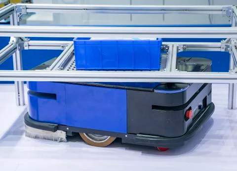 Automatic warehouse concept with drones moving inside a modern factory Stock Photos