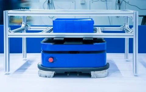 Automatic warehouse concept with drones moving inside a modern factory Stock Photos