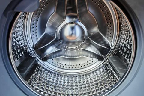 Automatic washing machine with empty steel drum. Stock Photos