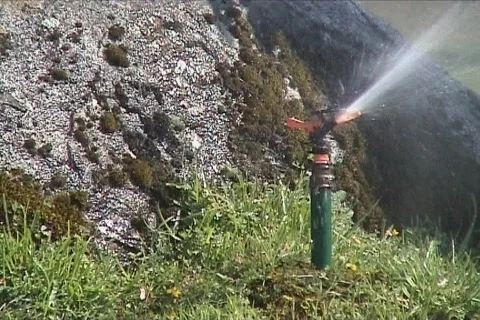 Automatic water sprinkler Stock Footage 107586