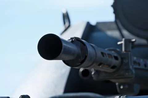 Automatic Weapon Barrel: Detailed Close-Up Views against Sky Background Stock Photos