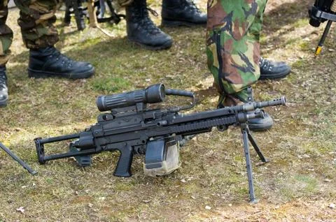 Automatic weapon on ground Stock Photos