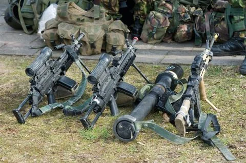 Automatic weapons on ground Stock Photos