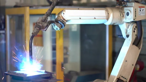 Automatic welding robot arms machine in factory industry. robotics technology Stock Footage 154486591