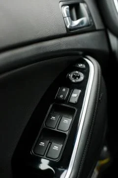 The automatic window on the car door handle Stock Photos