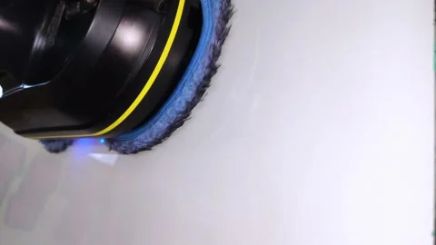 The automatic window cleaner drives and cleans the white surface. Cleaner robot  Video stock 140012114