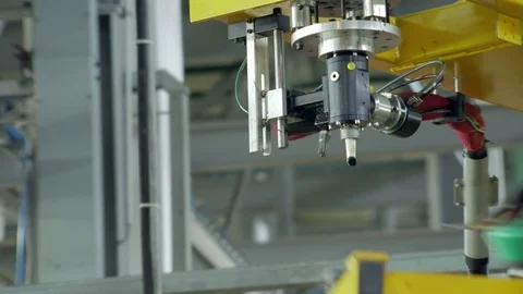 Automatically applying hermetic on a car window, close-up of moving robot Stockbeeldmateriaal 83437541