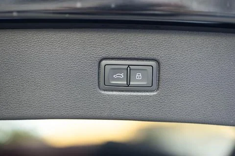 Automatically opening and closing the trunk. Button for automatic electric Stock Photos