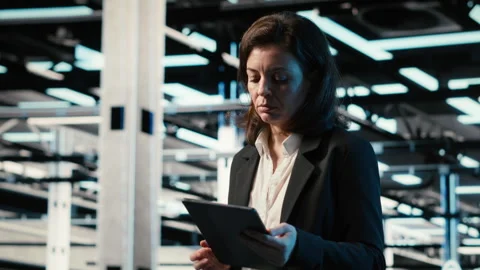 Automation, tablet and engineer walking in data center Stock Footage 329327191