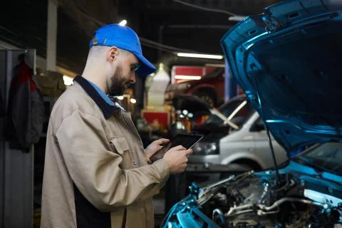 Automechanic Using Tablet PC Stock Photos