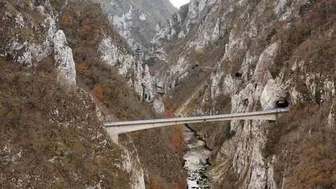 Automobile bridge in the gorge above the river Video stock 114974341