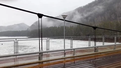 Automobile bridge over the mountain river Stock Footage 236835322