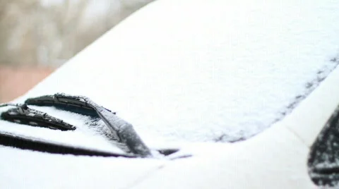 Automobile brushes clean glass from snow. Stock Footage