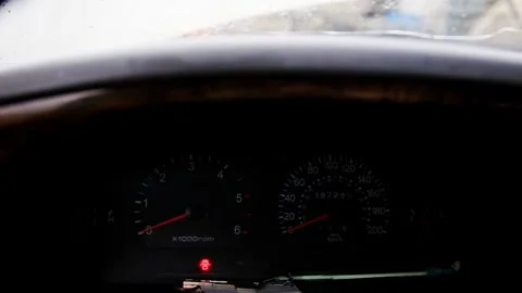 Automobile instrument cluster with active hazard light indicators blinking 스톡 동영상 329213979