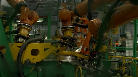 Automobile plant. the robot connects Stock Footage 142030153