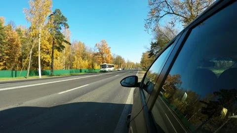 The automobile is pulling out the road side to the high road Stock Footage 106686930