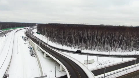 Automobile road between settlements with a multilayer road surface. Highway Stock Footage 155466132