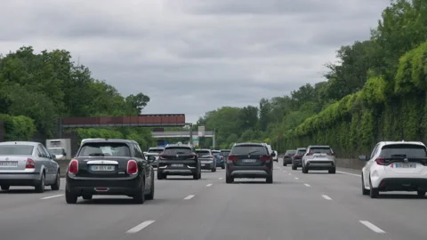 Automobile traffic driving on multi lane highway in France Video stock 336723802