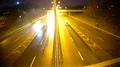 Automobiles driving fast on highway at night, risk of accident, rainy weather 4k or 4k+ Resolution