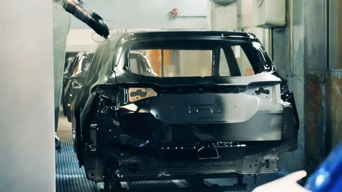Automotive carcass is getting mechanically galvanized in the factory Vídeo Stock 146512114