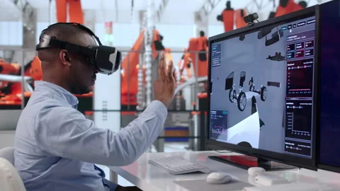 Automotive Engineer Uses Virtual Reality Headset Stock Footage 342978573