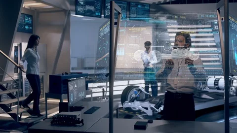 Automotive Engineers Analyzing Design and Performance of Electric Car Prototype Stock Footage 120541480