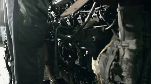 Automotive Mechanic Working On Bus Engine. Stock Footage 133745477