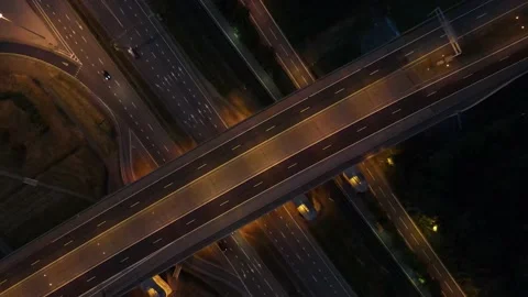 Automotive two-level interchange of highways in the night Stock Footage 135985555