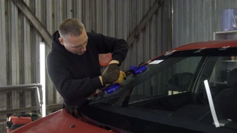 Automotive Windshield Installation. Guy Presses Auto Moldings Видео 218980254