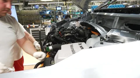 Automotive Worker Installing Components Inside Car Stock-Footage 346225839