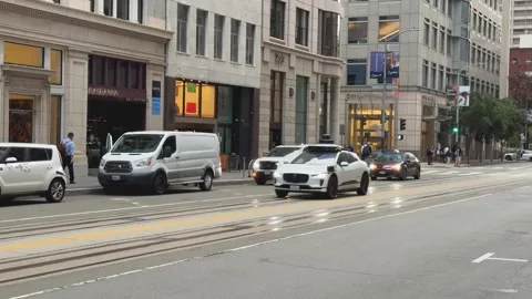 Autonomous Car Navigating Through Urban Traffic Stock Footage 266840852