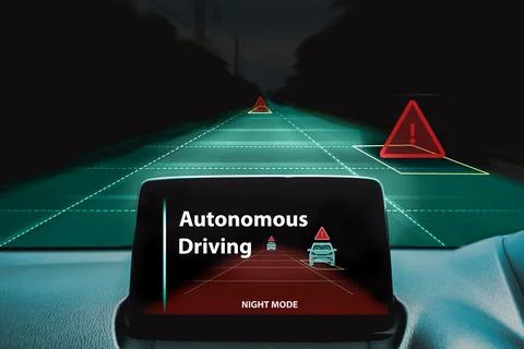 Autonomous driving technology at night mode in future driverless electric car Stock Photos