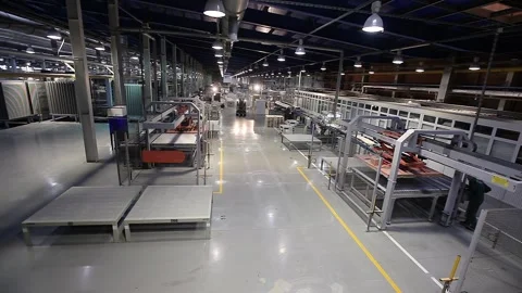 Autonomous guided vehicles and Autonomous Mobile Platform transport products in Stock Footage 321055299