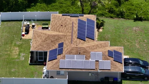 Autonomous home. Solar panels on house roof. Photovoltaic sells for producing Stock Footage 294455832