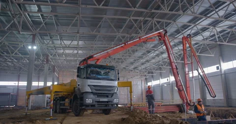 An autonomous mobile concrete pump at a construction site for pouring a floor  Stock Footage 161950135