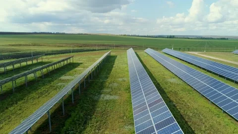Autonomous power system. Agricultural fields and a grove of trees in the Stock Footage 156369566
