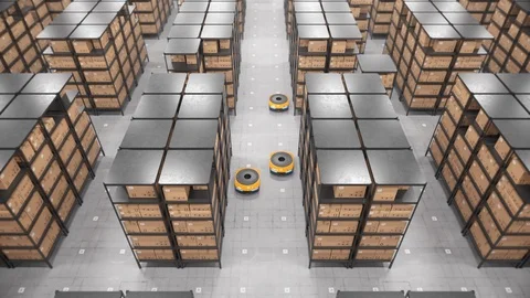 Autonomous robots moving shelves in automated warehouse. Seamless looping aerial Stock Footage 125861302