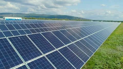 Autonomous solar station, silent work. Photolectric cell panel close-up. The sun Stock Footage 156369649