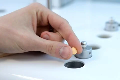 Autonomous solubility tester. Imitation dissolution of the table Stock Photos