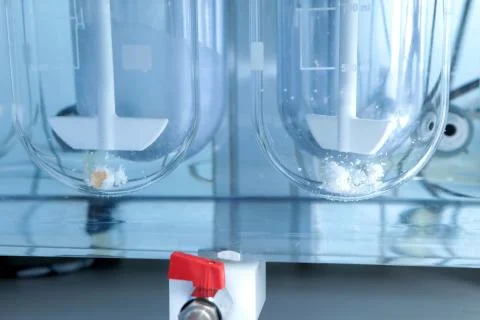 Autonomous solubility tester. Imitation dissolution of the table Stock Photos