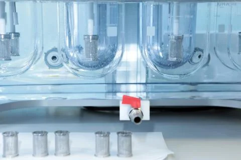 Autonomous solubility tester. Imitation dissolution of the table Stock Photos