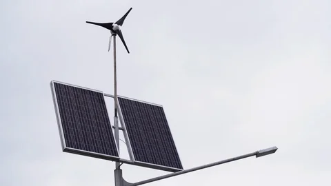Autonomous source of energy. Solar panels and a small wind turbine for the Stock Footage 107080972