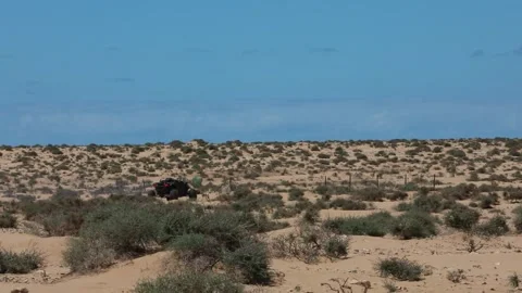Autonomous tactical vehicle fires a missile in the desert Stock Footage 334376809